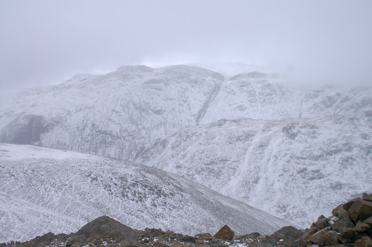 Mountains emerge from the snow