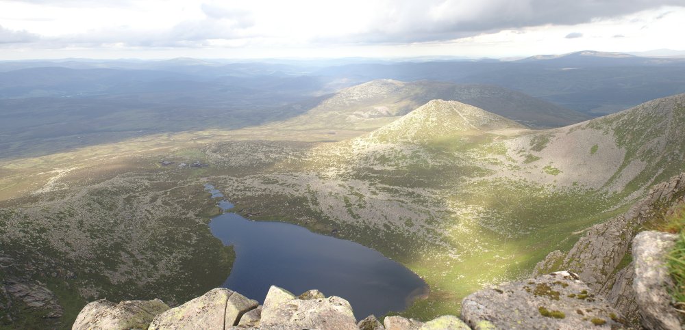 Looking down at the Lochan below the cliff Looking down at the Lochan below the cliff