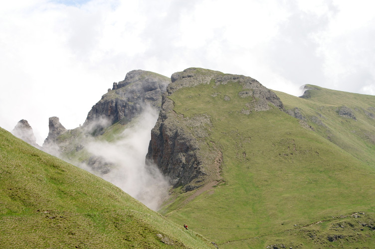 The mist behind a gap in the ridge