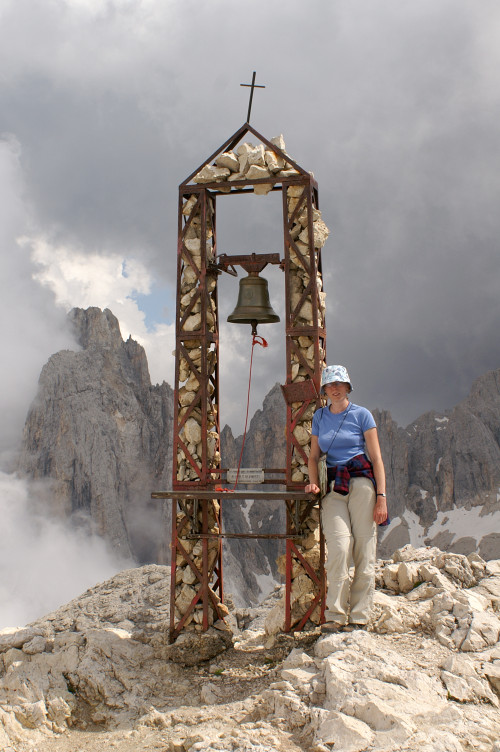 Ruth with the cross on the top of Monte Mulaz